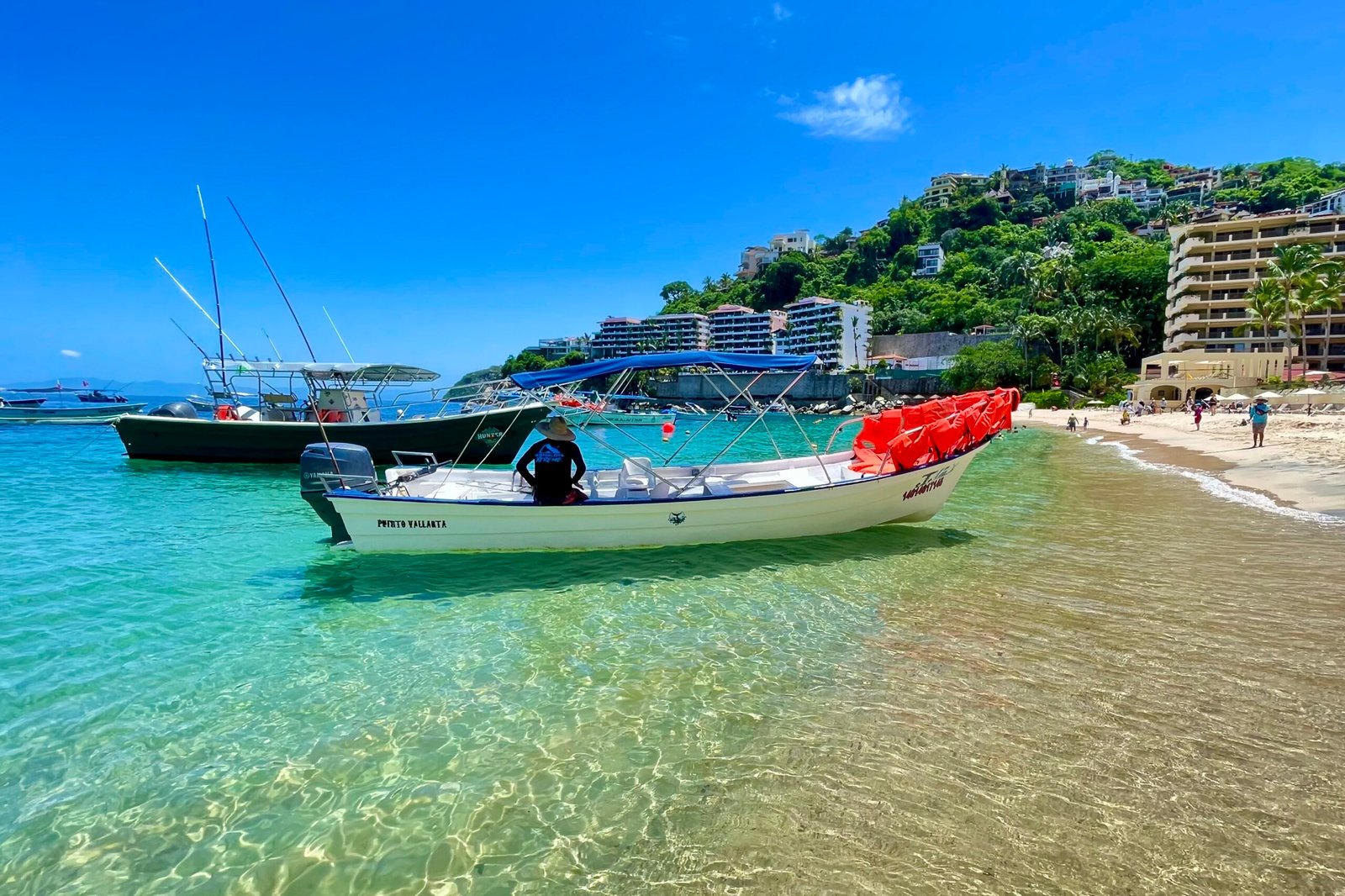 Local boat exploring the southern coast of Puerto Vallarta
