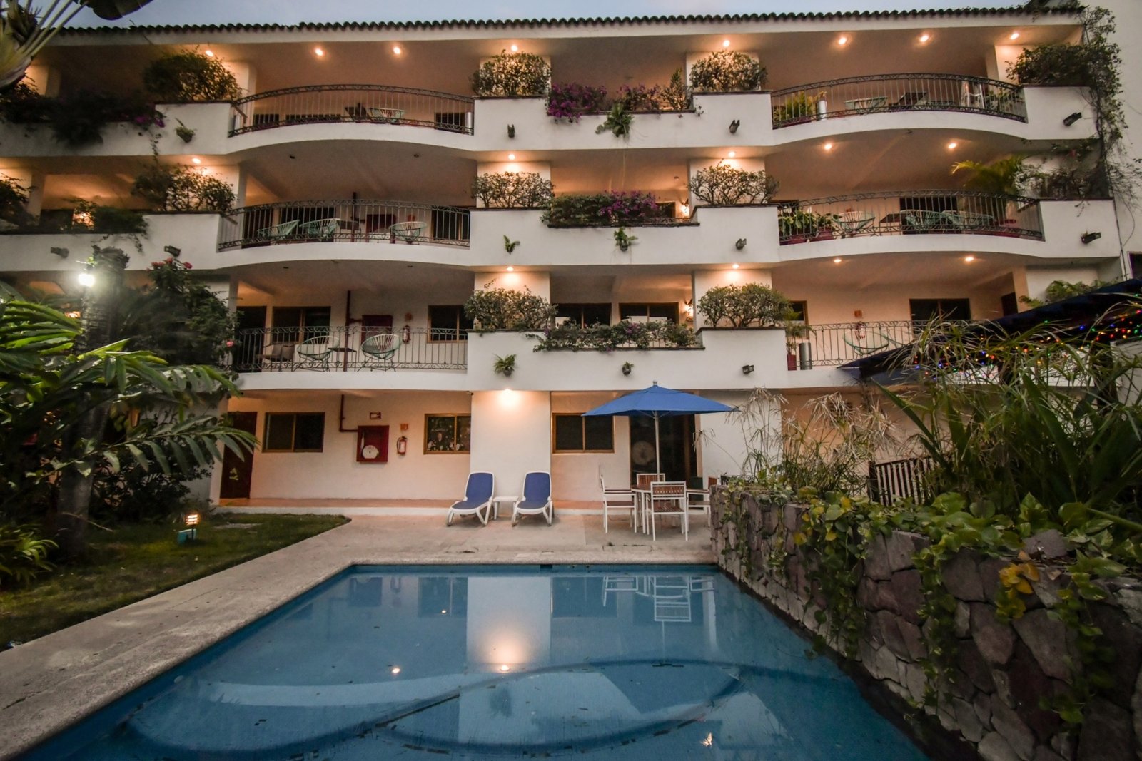 Hotel Casa Iguana Mismaloya surrounded by tropical gardens