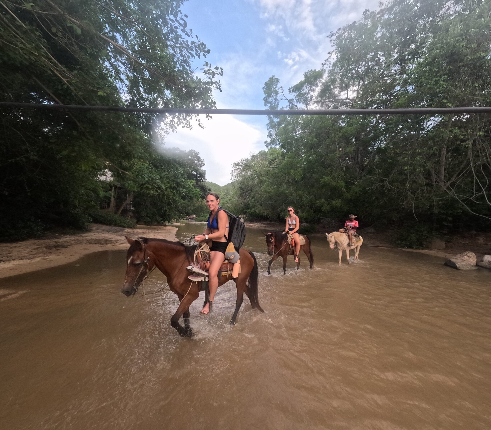 Horseback riding through the tropical jungle near Mismaloya, Puerto Vallarta